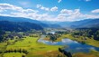 © Virgo Studio Maple - A stunning spring day landscaping views of fertile land surrounded beautiful green vegetation, wide stretches of hills and mountains with clear skies in spring