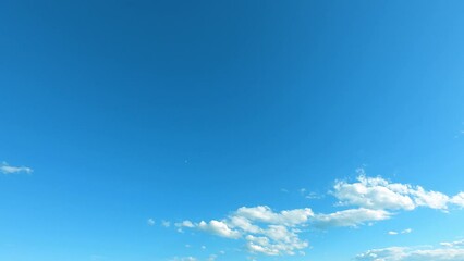 Wall Mural - clear blue sky in summer season. sky with fluffy white clouds in midday sunny day. traveling hight i