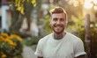 © piai - Smiling tattooed young man in casual clothing