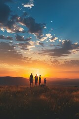 Wall Mural - Majestic silhouette of millennials in an expansive landscape.