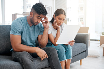 Sticker - Frustrated couple, sofa and documents with debt for financial crisis, expenses or bills at home. Man and woman in concern, stress or anxiety with paperwork for mortgage, house loan or eviction notice