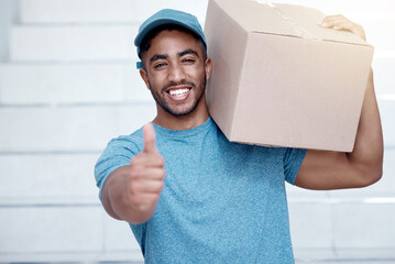 Delivery, thumbs up and portrait of man for logistics, box and shipping service by stairs n city. Ecommerce, retail and stock with courier, cargo and distribution or supplier of package in London