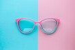 © Jullia - Vibrant Pink Sunglasses on a Dual-Tone Blue and Pink Background for Summer Fashion