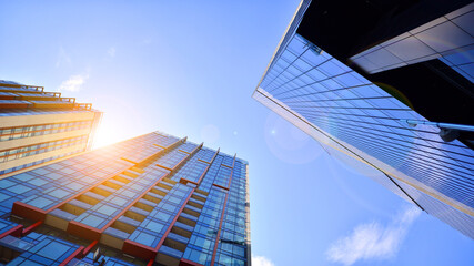 Wall Mural - Exterior of a high modern multi-story apartment building - facade, windows and balconies.