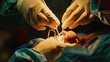 © Sittipol  - The surgeon's hands are shown close up as they perform a surgical procedure.