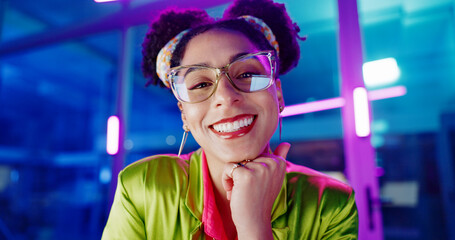 Fototapete - Face, computer and neon with programmer woman in office at night for coding or developing. Portrait, smile or happy young game developer sitting at desk in workplace with virtual system update