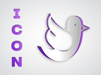 Sticker - Paper cut Dove icon isolated on grey background. Paper art style. Vector