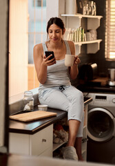 Poster - Morning, coffee and woman with cellphone in home for social media, chat and text message with contact. House, girl and smartphone for networking, browsing and scrolling in kitchen with beverage