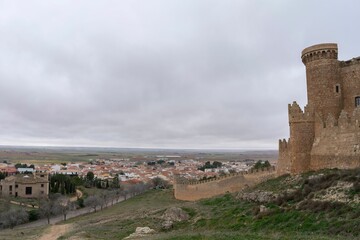 Wall Mural - The castle of Belmonte on the right of the photo and the village of the same name in the background