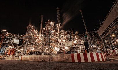 Poster - Oil​ refinery​ night plant and tower of Petrochemistry industry in oil​.