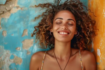 portrait of a smiling woman with curly hair