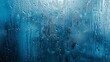 © Bijac - abstract background with rain droplets on window creating blue aqua texture romantic overlay for stormy weather