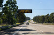 © Austockphoto - Overhead digital sign reading trucks have blind spots can they see you?