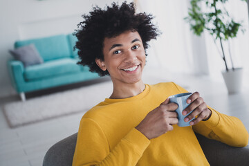 Canvas Print - Photo of cheerful nice young man enjoying morning day weekend comfortable room indoors