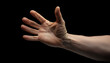 © LADALIDI - Expressive human open hand with detailed palm lines isolated on black, reaching out, symbolizing connection & identity.