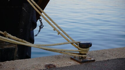 boat moored at the port's metal mooring