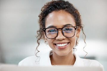 Wall Mural - Portrait, smile and business woman in glasses on laptop in office for software development in startup. Face, reflection or happy professional entrepreneur, web designer or creative employee in Brazil