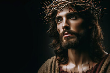 Jesus Christ wearing crown of thorns Passion and Resurection Isolated on black background