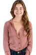 © mashimara - Photo of a smiling young woman with long brown hair, wearing a pink button-up shirt and dark jeans, standing against a white background.