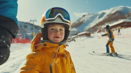 Sticker - A young child wearing a yellow jacket and goggles is smiling as he stands on a ski slope. The scene is lively and fun, with other people skiing in the background