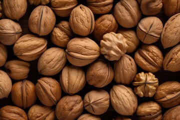 Wall Mural - a pile of walnuts with a blue background, A collection of walnuts set against a blue backdrop.