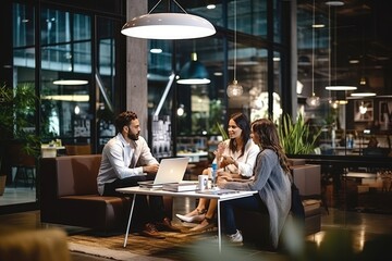 Poster - a group of people sitting at a table in an office, In an office setting, there is a gathering of individuals seated around a table.
