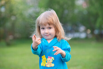 Canvas Print - portrait of a girl, blonde, child happy and laughing, Ukrainian girl, happiness, hairstyle, weeds, cereals, childhood, baby, kid,