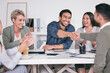 © peopleimages.com - Businesspeople, handshake and meeting in office with smile, congratulations and welcome in team. Trust, corporate and workforce together with new employee in company or management promotion in London