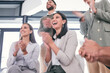 © peopleimages.com - Business people, teamwork and clapping in office for celebration, creative meeting or deal success. Happy, colleagues or corporate crowd together in workplace for group applause or company event
