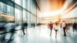 © MahmudulHassan - Blurred image of business people walking in the lobby of a modern office.
