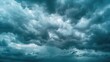 © buraratn - A dramatic sky filled with dark storm clouds, creating a sense of intensity and power