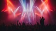© buraratn - Colorful stage lights illuminating a concert venue, creating a vibrant and energetic atmosphere