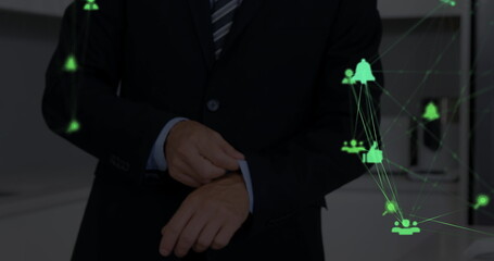 Wall Mural - caucasian businessman checking his watch, surrounded by network graphics