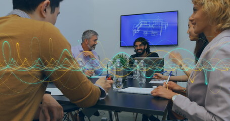 Canvas Print - Image of data processing against diverse colleagues discussing together at office