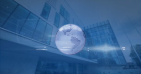 Poster - Image of spinning globe and light spot against low angle view of tall building