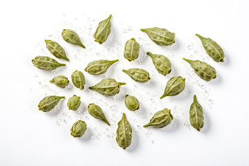Green Capers on White Background