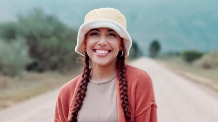 Poster - Outdoor, road and face of woman with smile in nature for vacation, travel and adventure at countryside. Person, relax and happy with hat in pride for journey, holiday and tourism in New Zealand