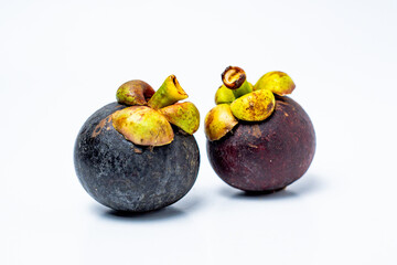 Wall Mural - Mangosteen fruit isolated on white background. Mangosteen is known as a fruit that has very high levels of antioxidants. Garcinia mangostana