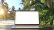 © Johannes - Closeup laptop mockup with blanks screen on the tropical summer background