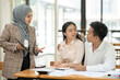 © aekachai - Asian businessmen, women and men Talk about new projects, presents at home office.