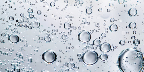 Wall Mural - water drops on white background, banner,dew or dripping rain droplets,cool surface on glass