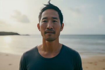 Wall Mural - portrait of japanese man at beach