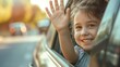 © Татьяна Евдокимова - Happy young girl waves goodbye from the backseat of a car, capturing a moment of joyful departure in warm sunlight
