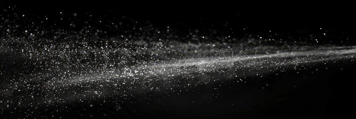 Wall Mural - Water spray on black background, white water droplets falling in the air, particles of dust floating in space.Abstract black and white bokeh lights with sparkling particles creating a dramatic