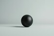 © Merilno - Black Ball on White Floor
