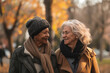 © Татьяна Евдокимова - Heartwarming photo capturing a moment between two senior women smiling and enjoying each other's company on an autumnal stroll