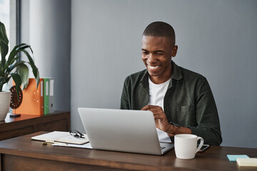 Fototapete - Business, laptop and happy black man in office for good news, research and check information in creative startup. Computer, graphic designer and reading email on internet for planning project online