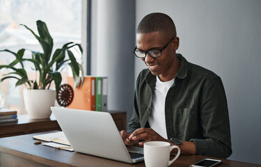 Fototapete - Business, laptop and happy black man typing in office for software, research or check information in creative startup. Computer, web developer or reading email on internet for planning online project
