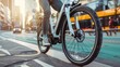 © pawimon - Electric Bicycles Focus on a person riding an electric bicycle in a city with a bike lane background, empty space right for text