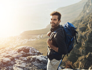 portrait, mountains and hiking with man, smile and journey with nature, sunshine and getaway trip. h